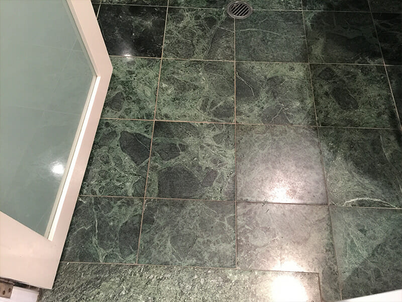 Green marble floor before polishing
