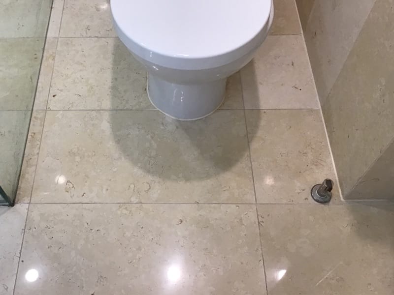 Marble floor without brown stain after the stone stain removal Reactive Poultice was applied by The Marble Man