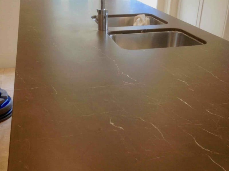 Black marble etching after honing