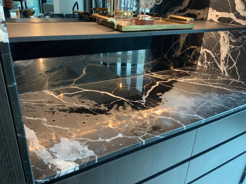 Black and cream marble bar before polishing and Satin Tuffskin