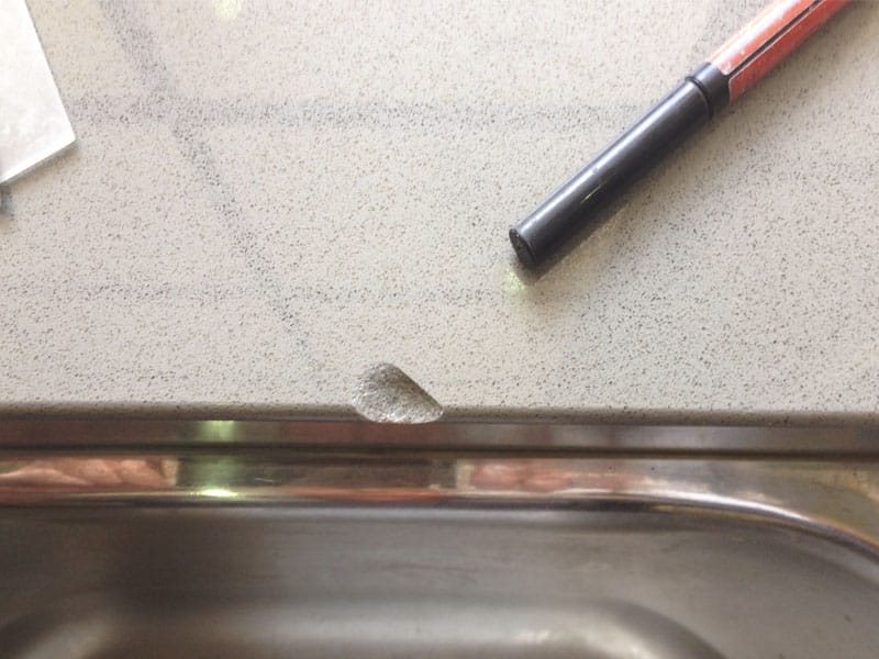 Benchtop chip before repair